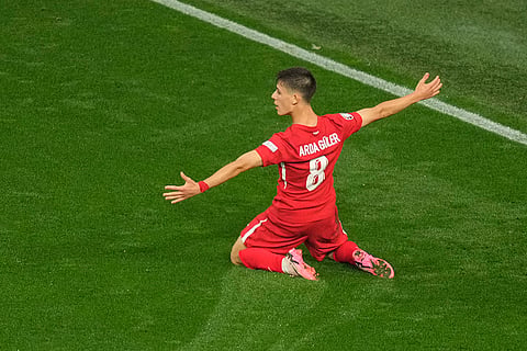 Turkey's Arda Guler celebrates after scoring his side's second goal 
